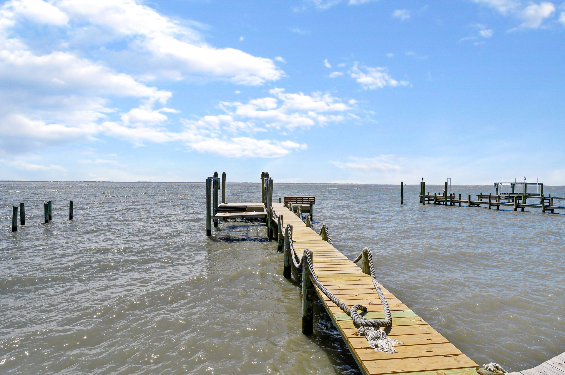 Lammers Largo sits Direct Bayfront in Captain's Cove Golf and Yacht Club.