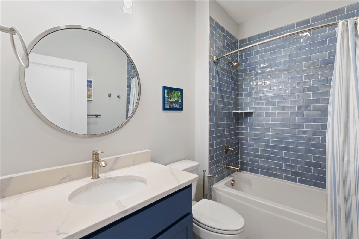 The Shared Full Bath offers a Custom Tile Shower/Tub Combo.