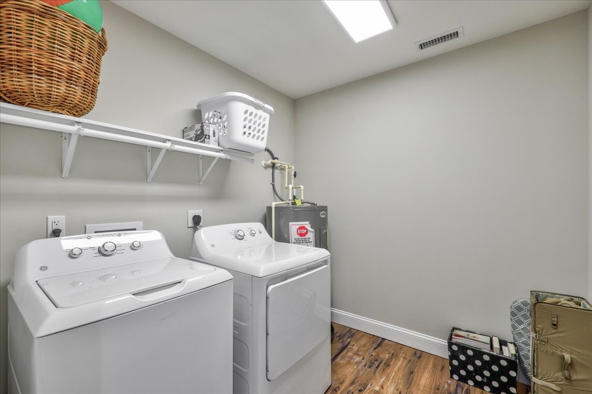 Upstairs Laundry with Full Size Washer and Dryer.
