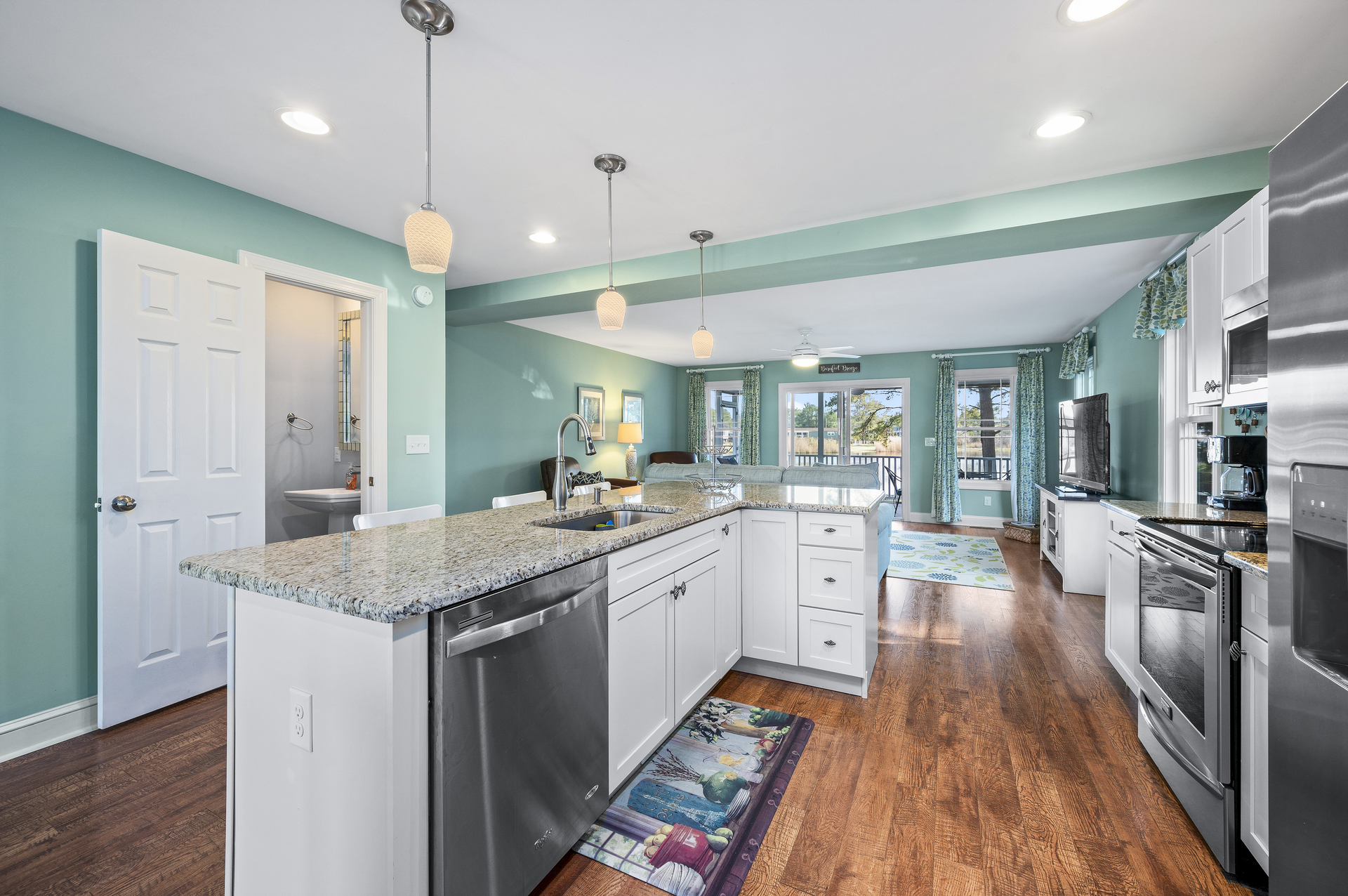 Kitchen has Stainless Appliances and gleaming Granite.