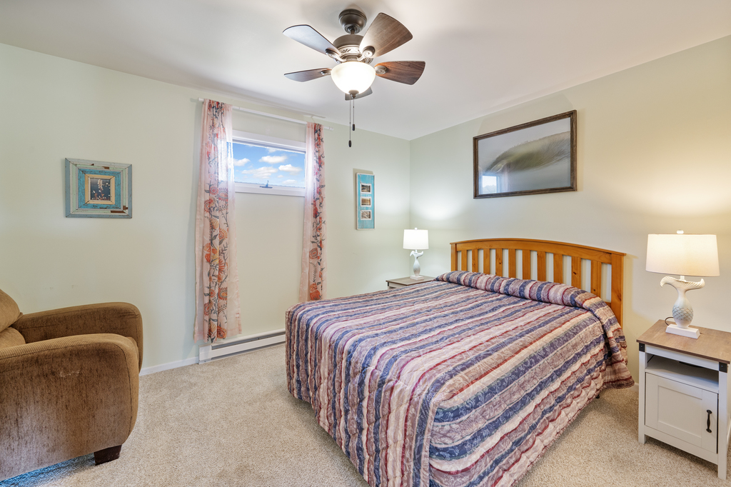 Private Bedroom with Queen Bed and Sitting Area.