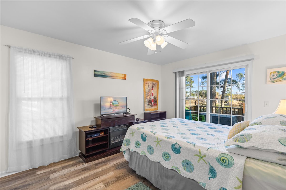 Bedroom 1 has a Flat Screen Smart TV and Access to rear Deck.