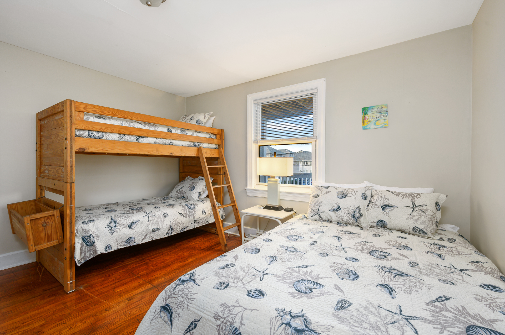 Bedroom 1 will comfortably sleep 4 with a Queen bed and Twin bunk