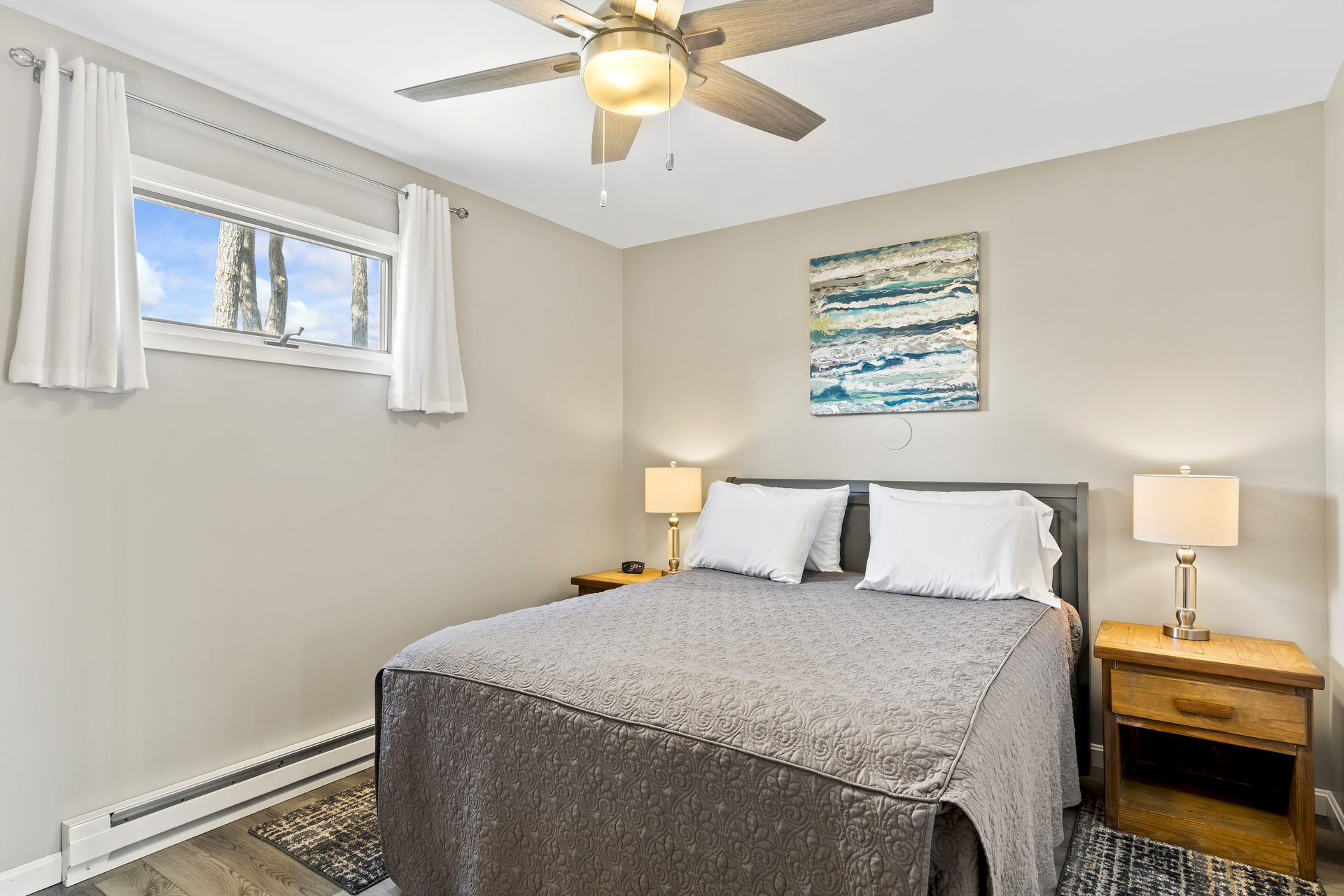 Newly Renovated Bedroom has a comfy Queen Bed.