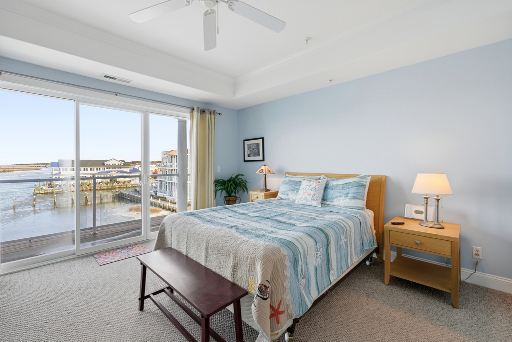 Huge Primary Bedroom features a comfy Queen Bed and incredible Bay Views.