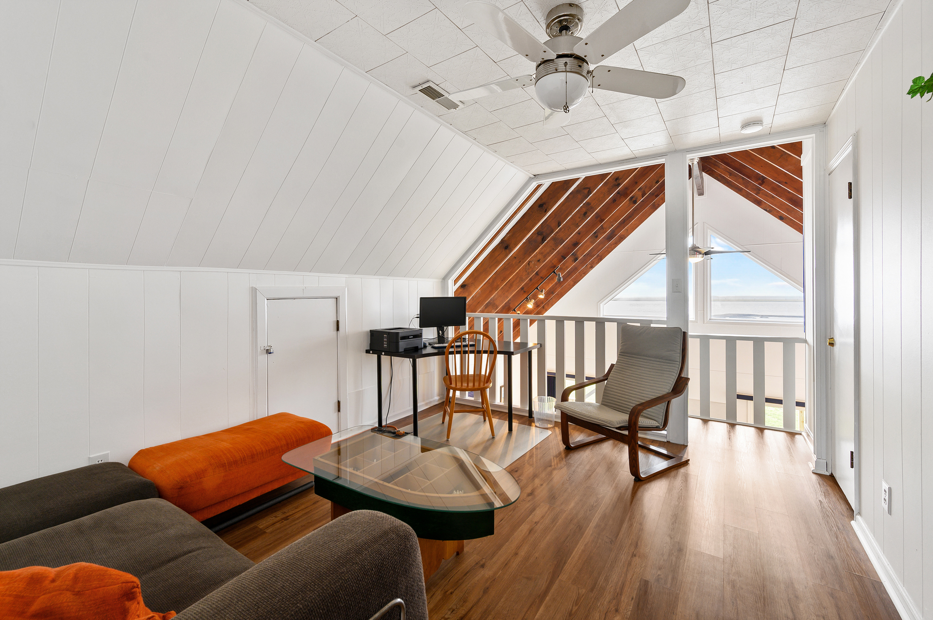 Wandering upstairs, you'll find a cozy Sitting Area and Work Space.