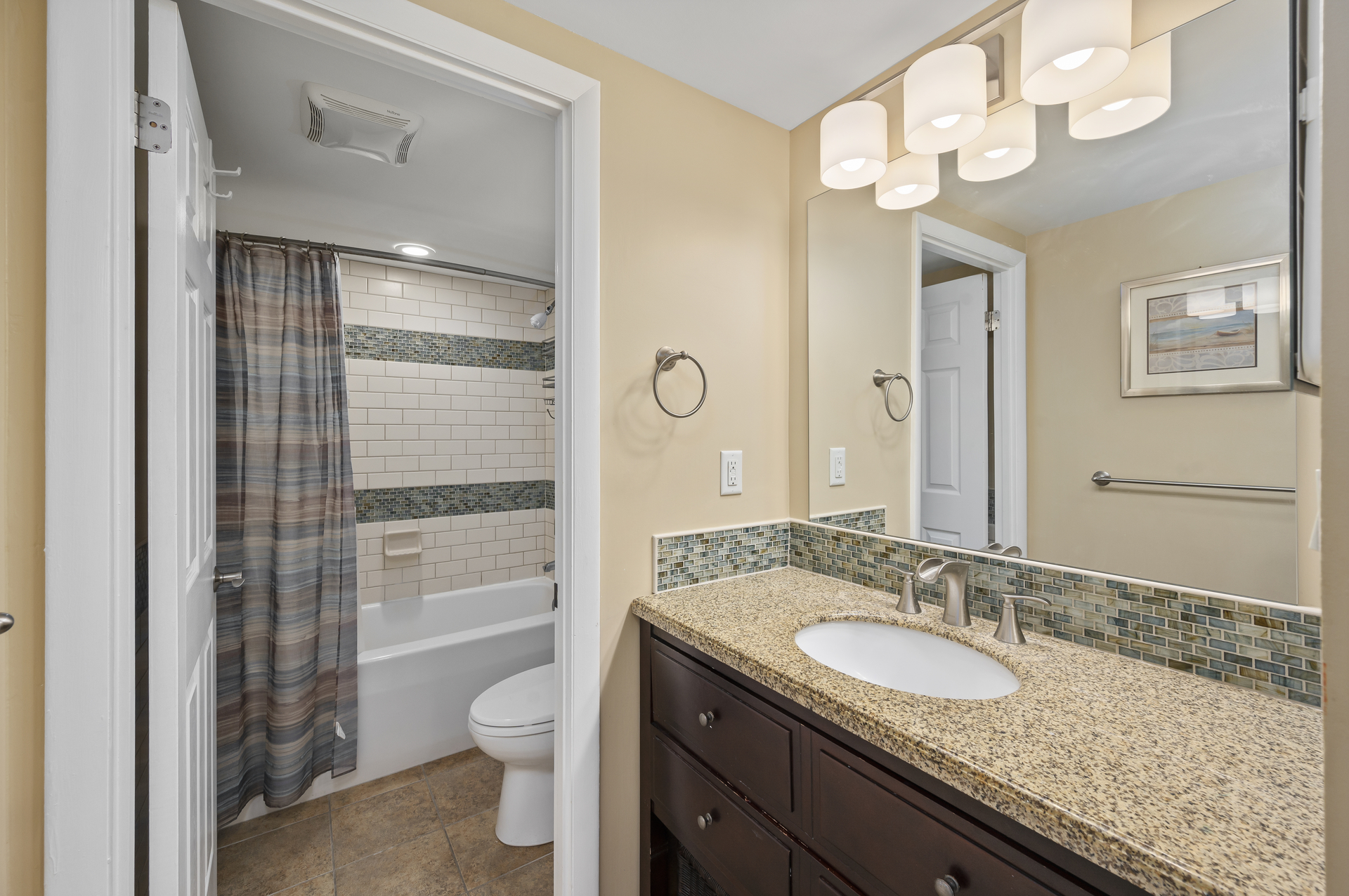 Full Shared Bath in the Hall offers a Shower/Tub Combo.