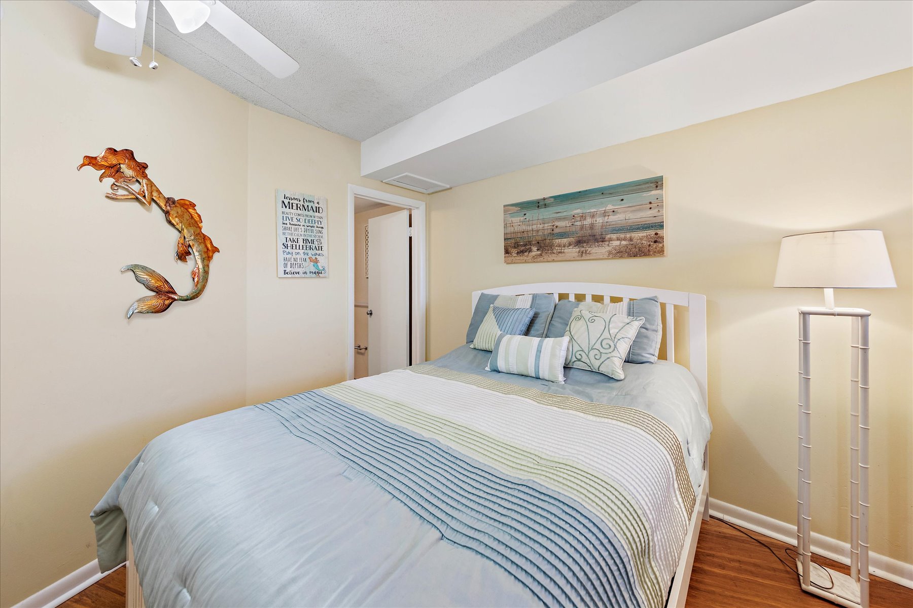 Bedroom 2 is Warm & Cozy with a Queen Bed.