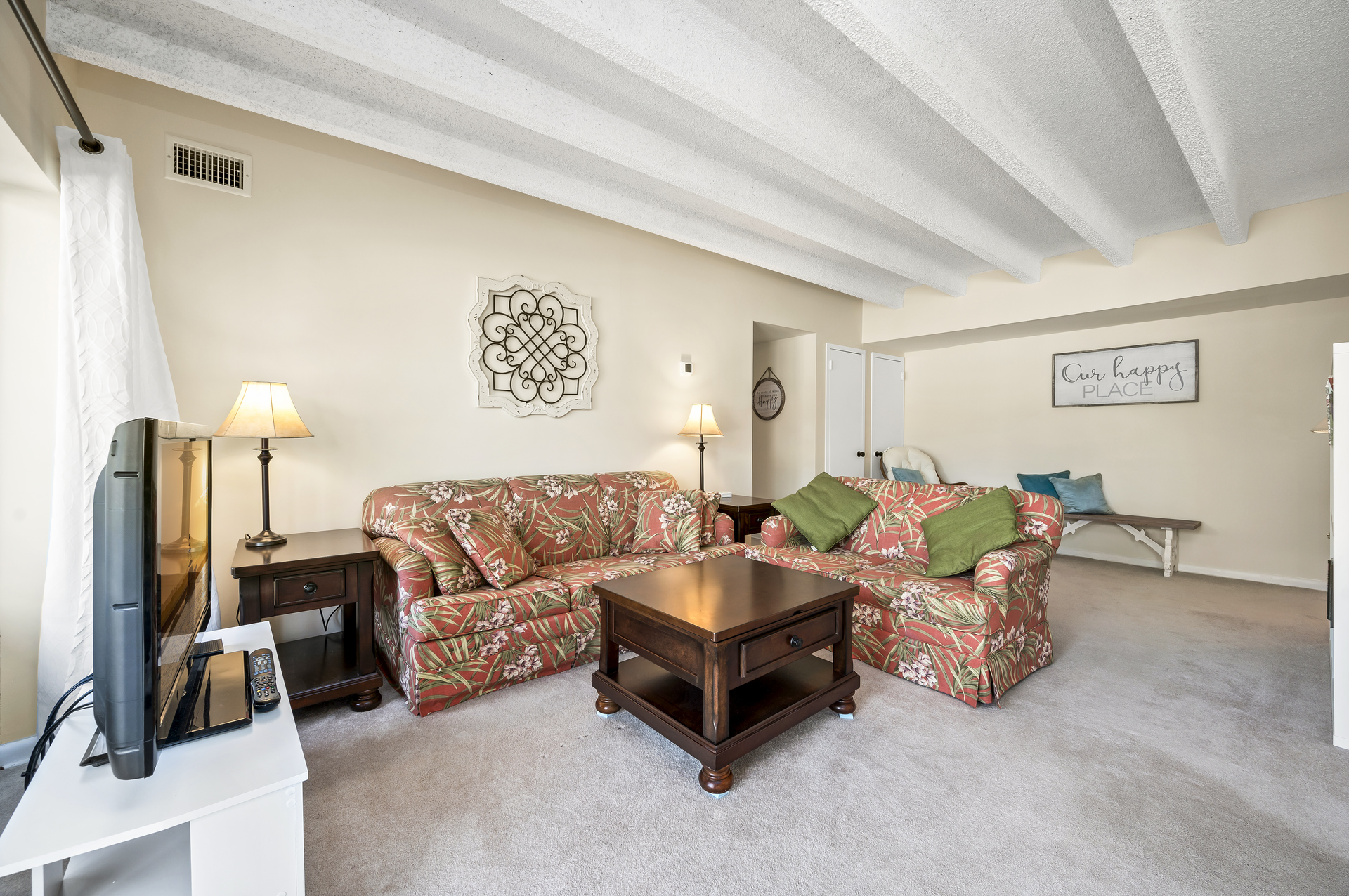 Comfy Living Area with Sleeper Sofa, Free WiFi, and Flat Screen Cable TV.