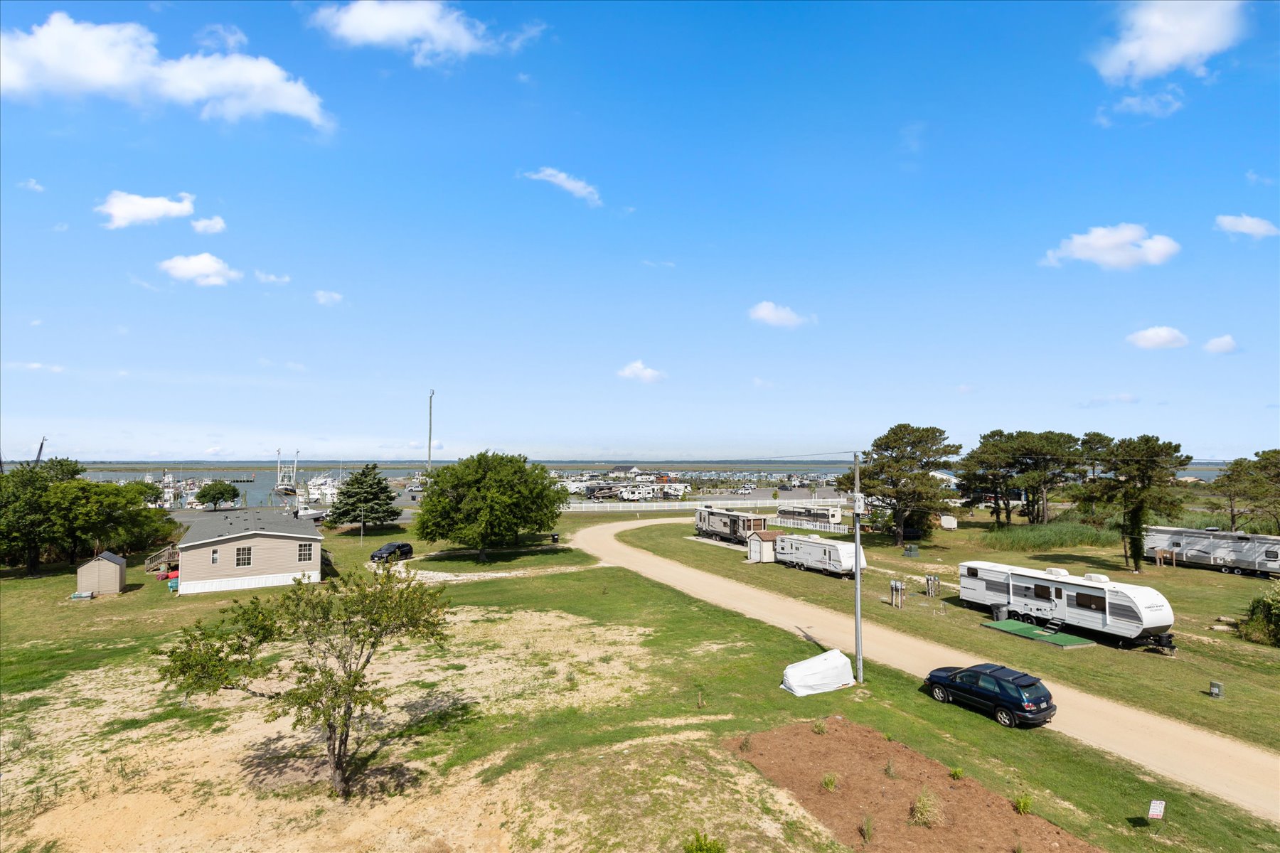 Follow this sleepy dirt road a very short distance to your Vacation Paradise!
