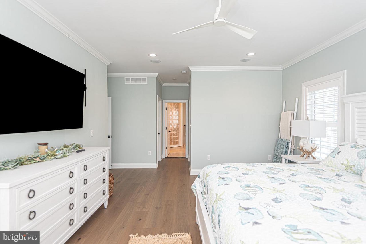 This Spacious Bedroom, located just off the Living Room, has a Flat Screen TV.