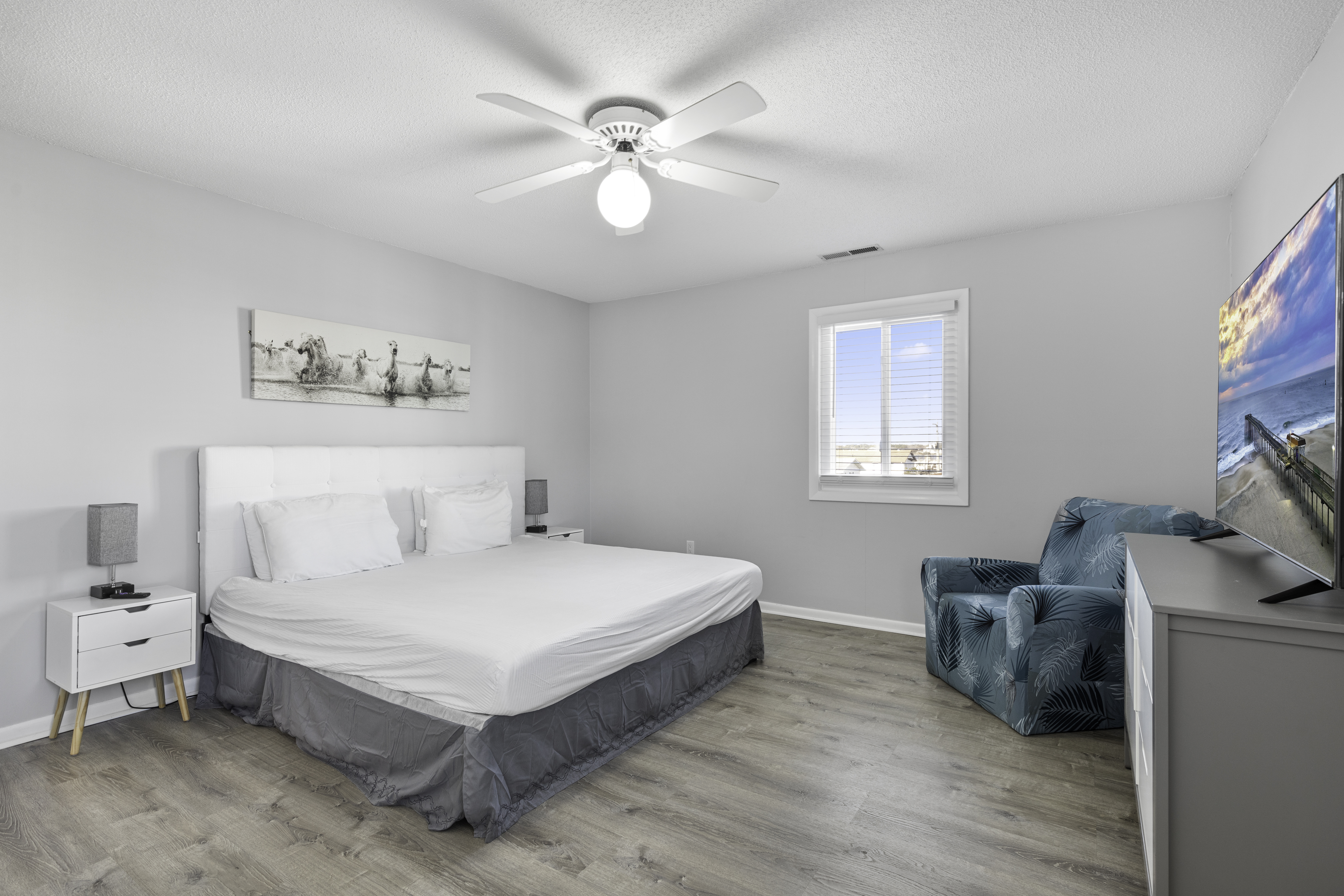 The Primary Bedroom features a King Size Bed to sprawl out on.