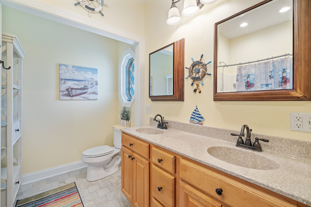 Primary Attached Full Bath with Double Vanity.