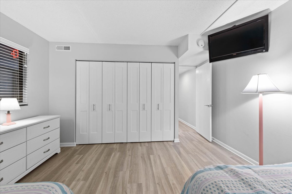 With a Flat Screen TV & plenty of Closet Space!