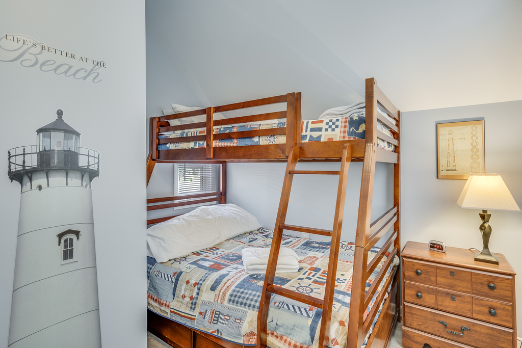 Bedroom 1 has an adorable Lighthouse Theme and Pyramid Bunk.
