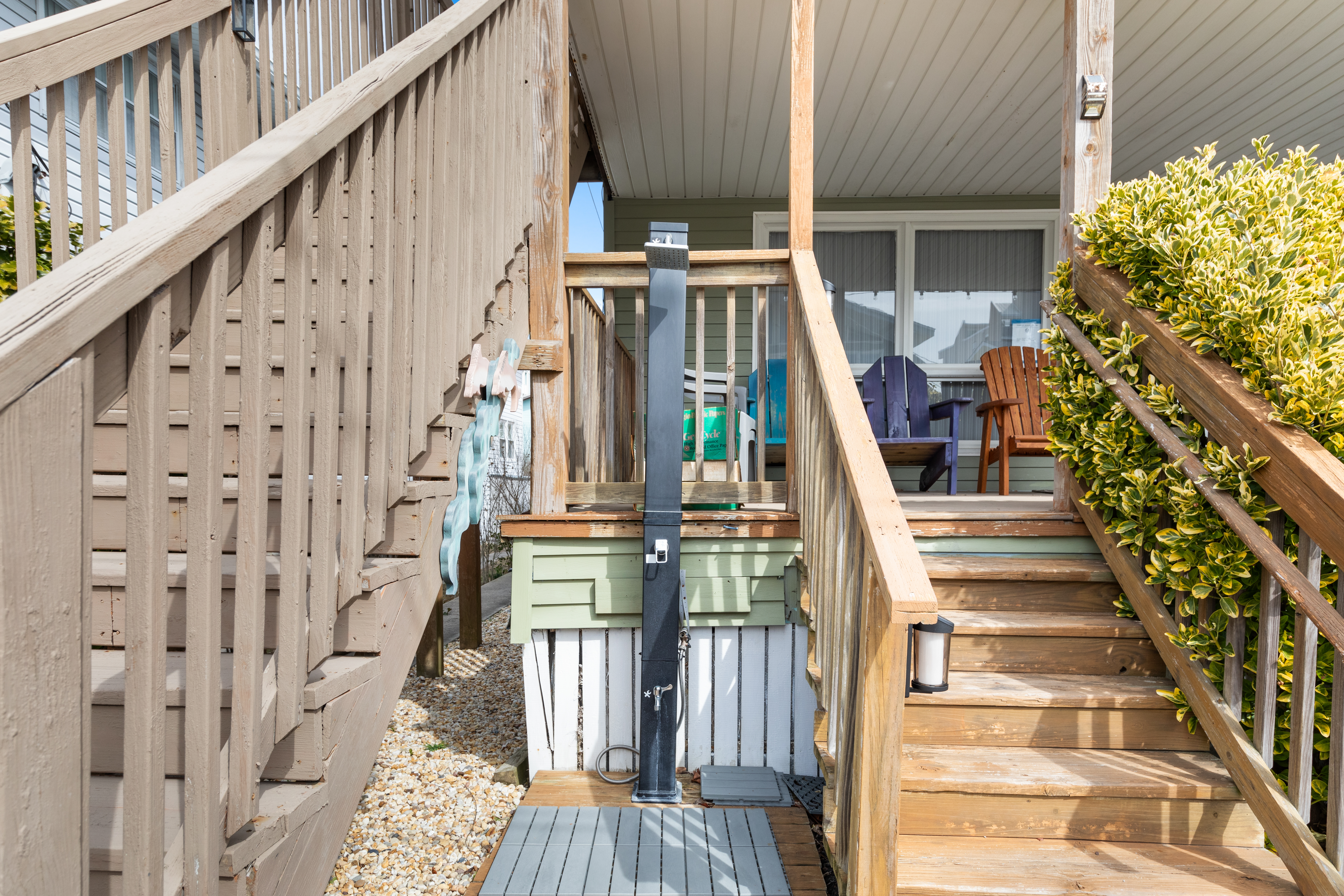 Trashcans are located right off the porch when you enter the home.