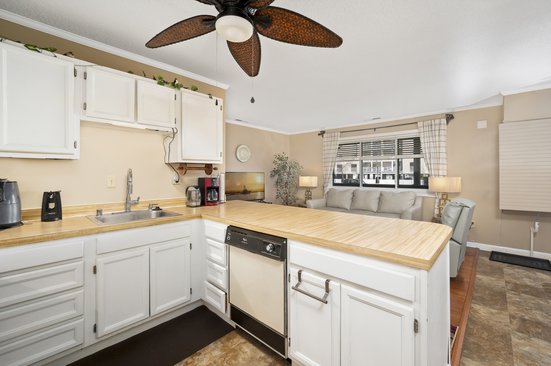 Gleaming white cabinets and countertops reminiscent of the sandy Ocean City beach!