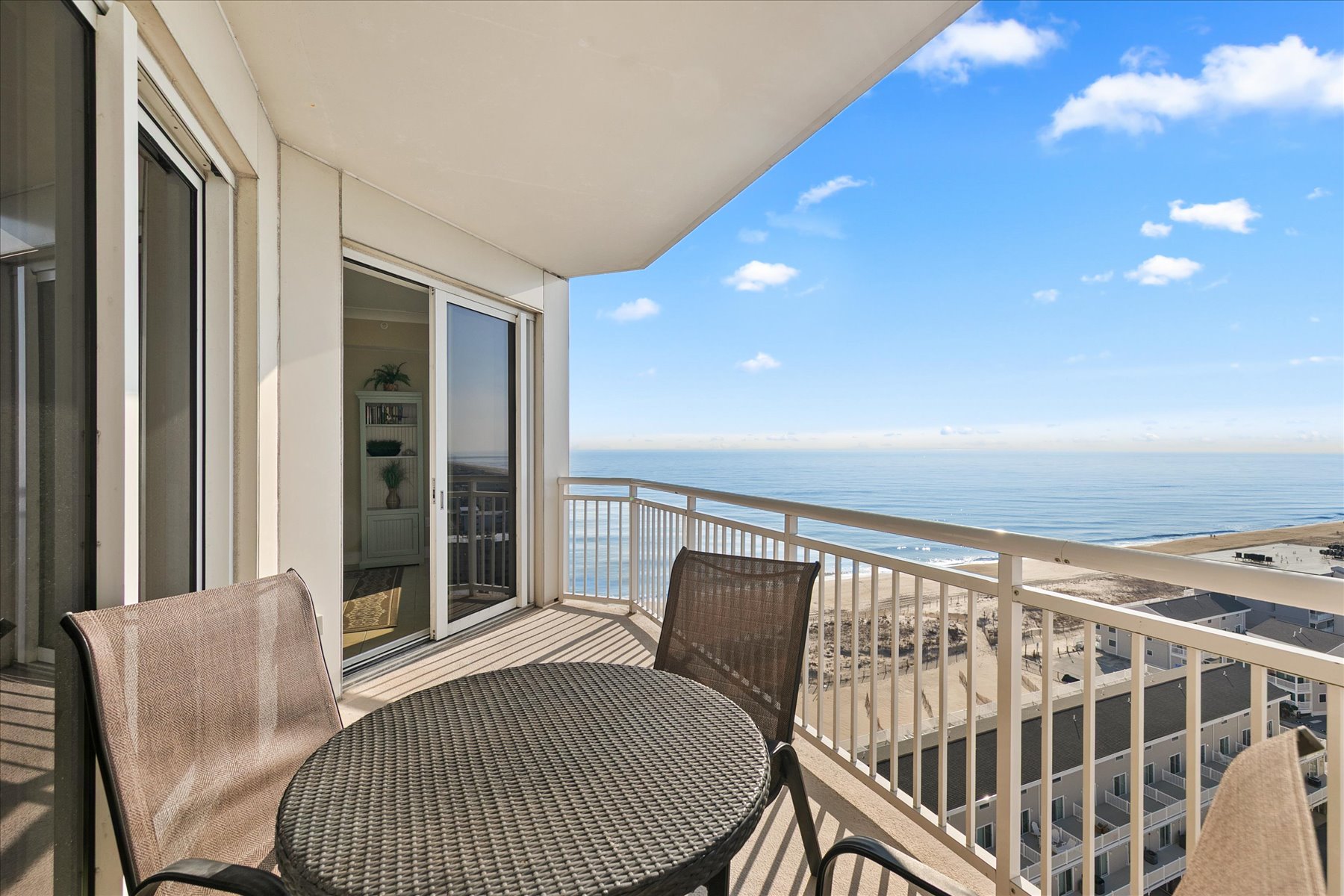 Step onto the private balcony and take in breathtaking ocean vistas.
