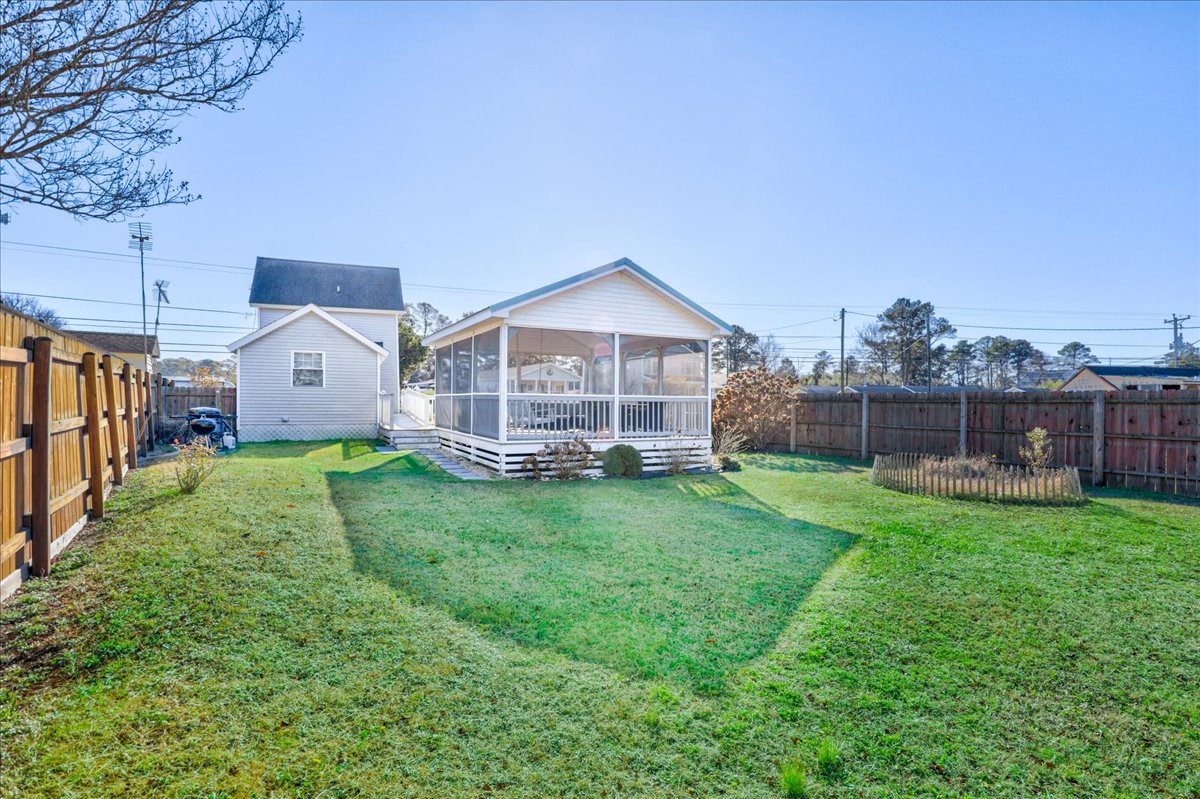 View of Detached Screened Porch from backyard.