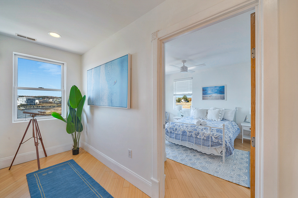 Down the Hall, you'll find Bedrooms 2 and 3.