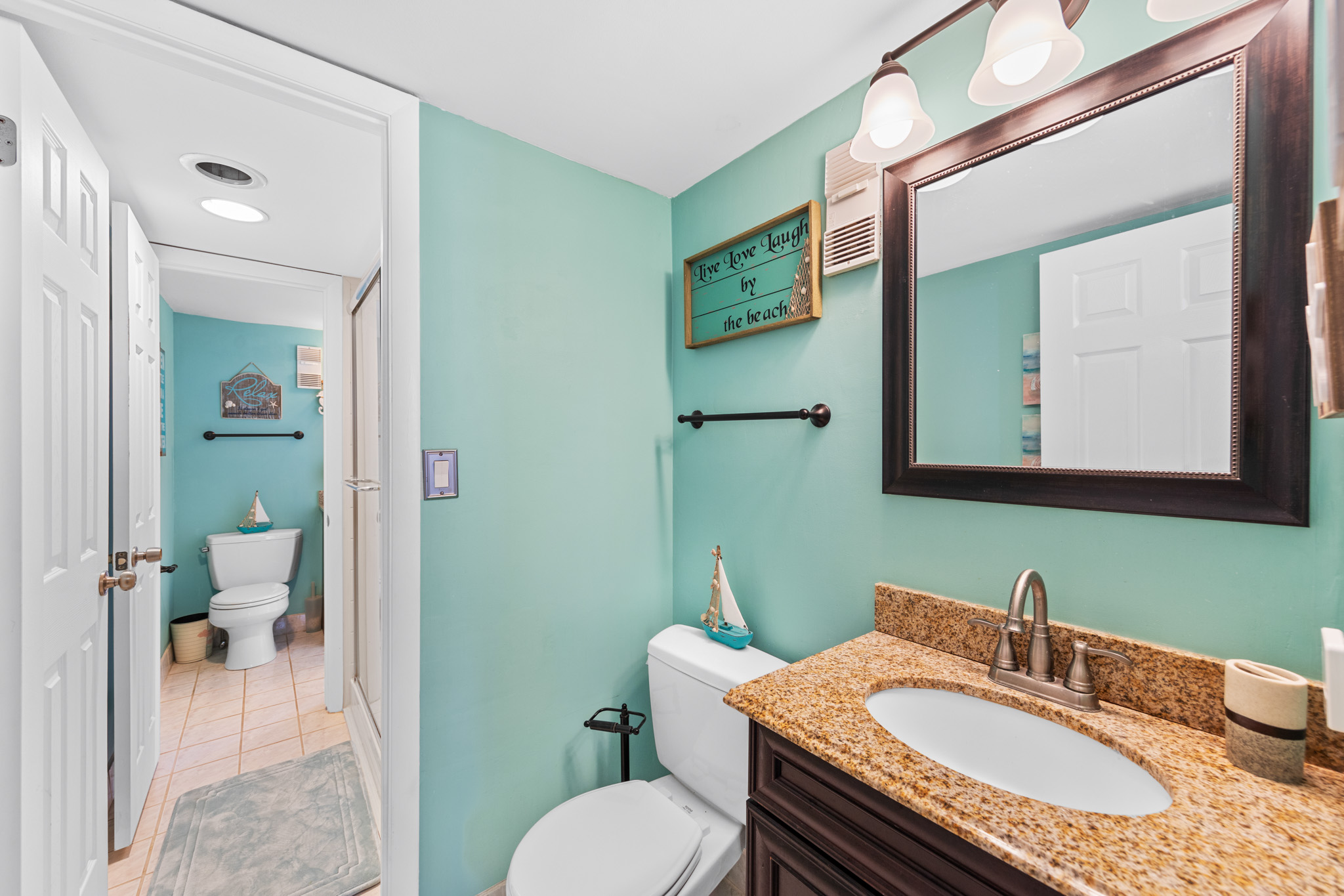 The Unique Bathroom layout offers 2 vanity areas, with a joining Walk-In Shower area.