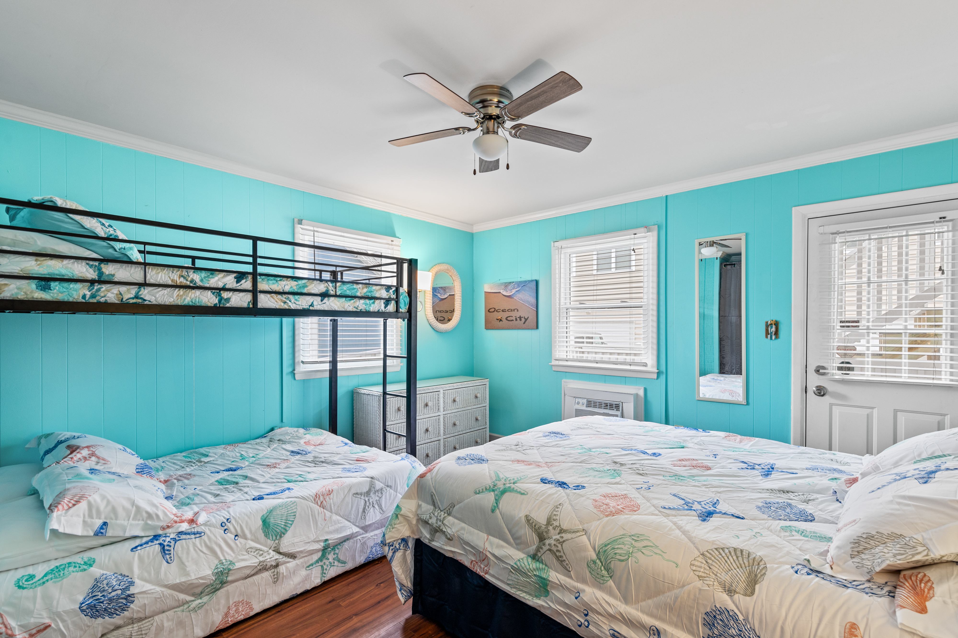 You'll love the Bright and Beachy Blues of this bedroom!