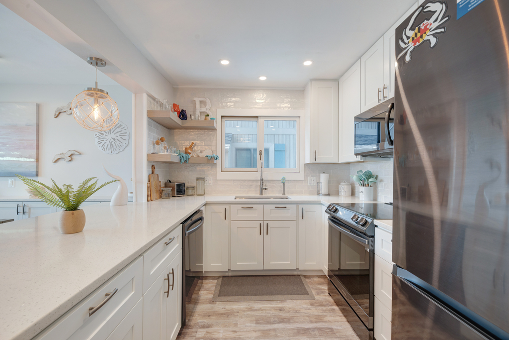 This Stunning and Bright Kitchen is Well-Stocked with everything you'll need!