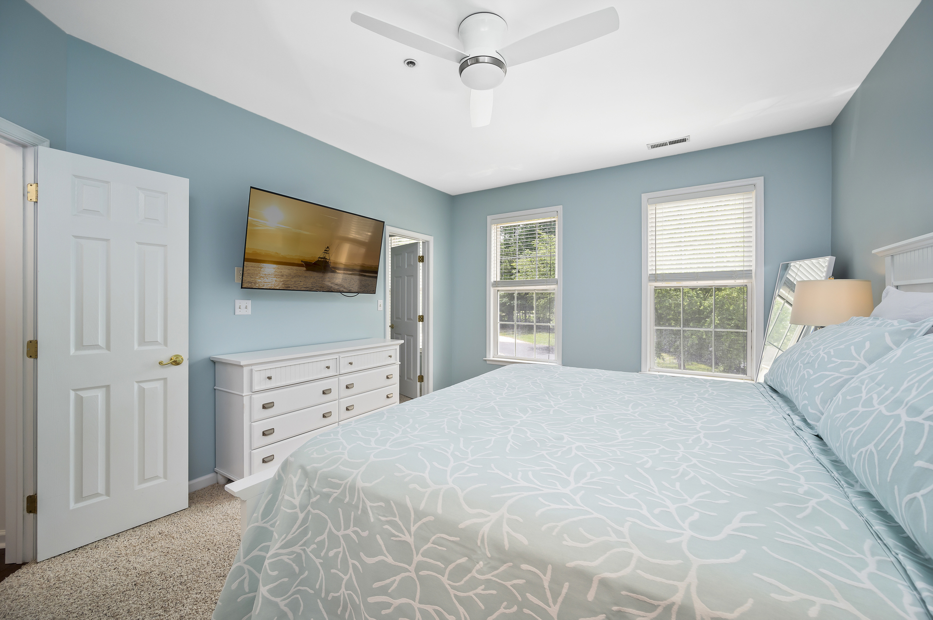 Primary Bedroom with Smart TV and large walk in closet