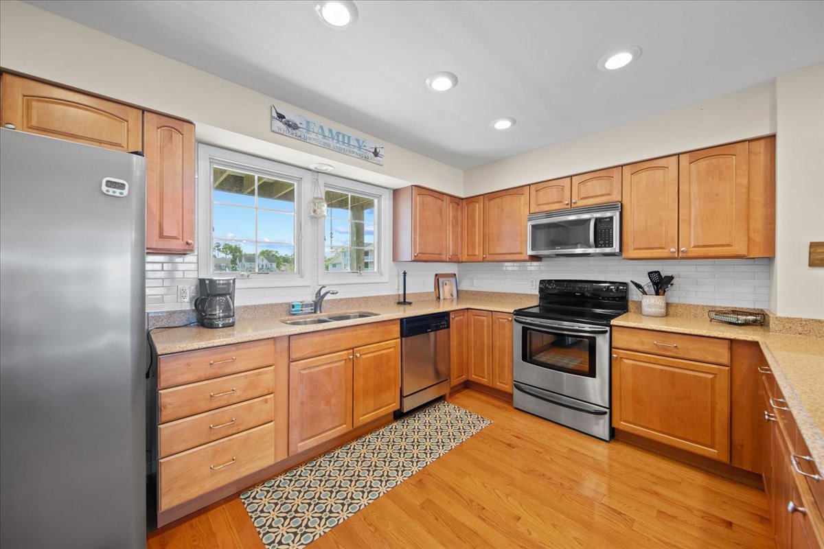 Kitchen is well-equipped with all the comforts of Home.