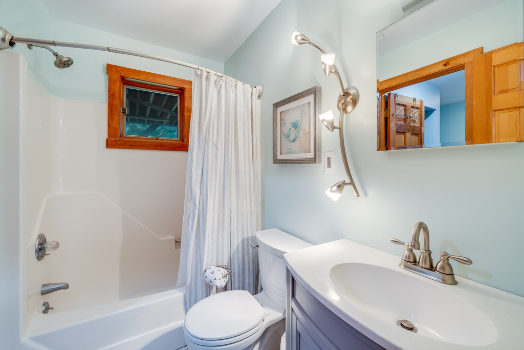Full Bath 1 has a Tub/Shower Combo and is convenient to Bedroom and Living Area.