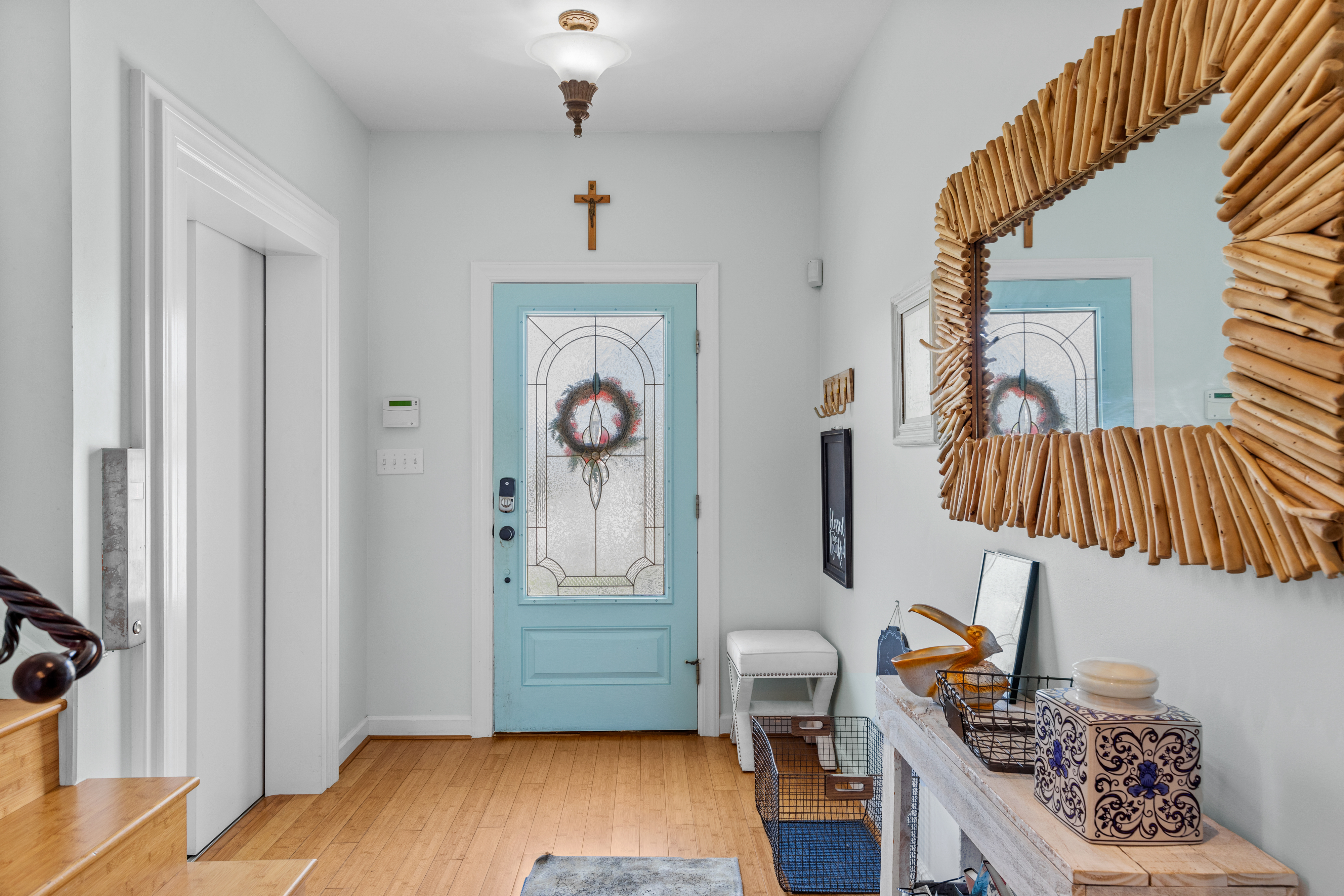 As you enter the 1st Floor, you'll absolutely love the gorgeous Flooring and serene Coastal Decor.