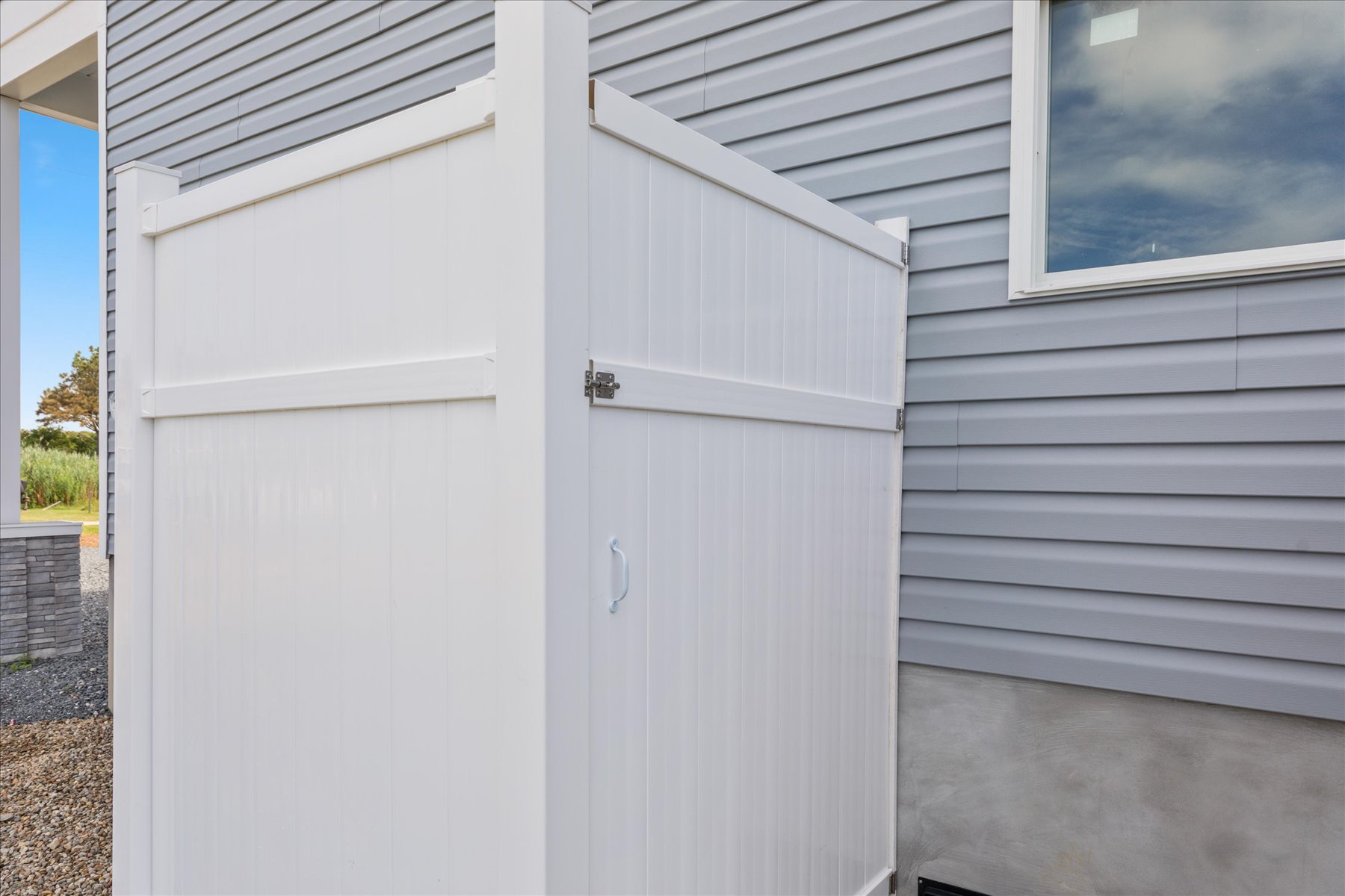 A refreshing Outdoor Shower for rinsing off sandy feet.