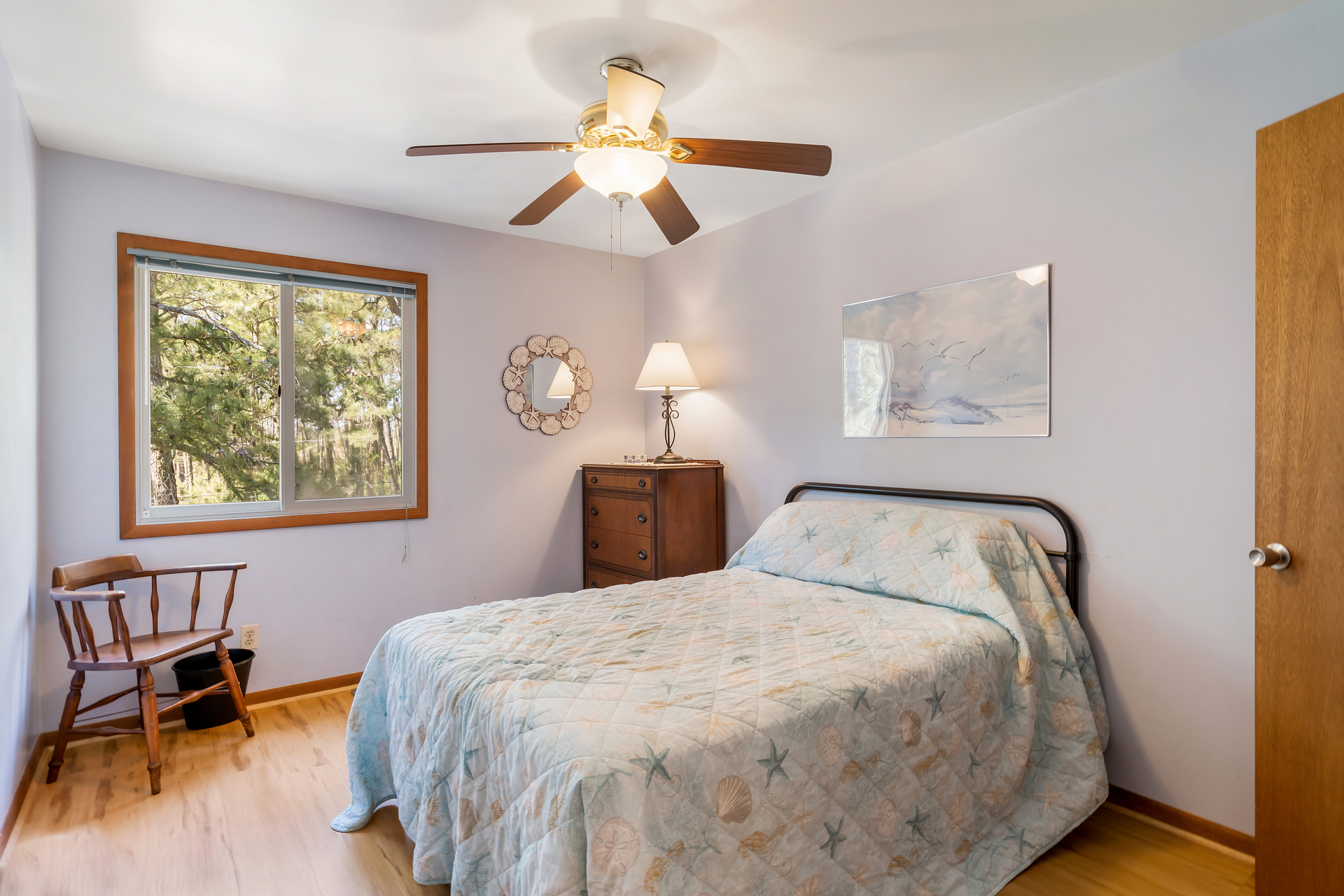 Bedroom 3 has a Full Bed and soothing Blue Walls.