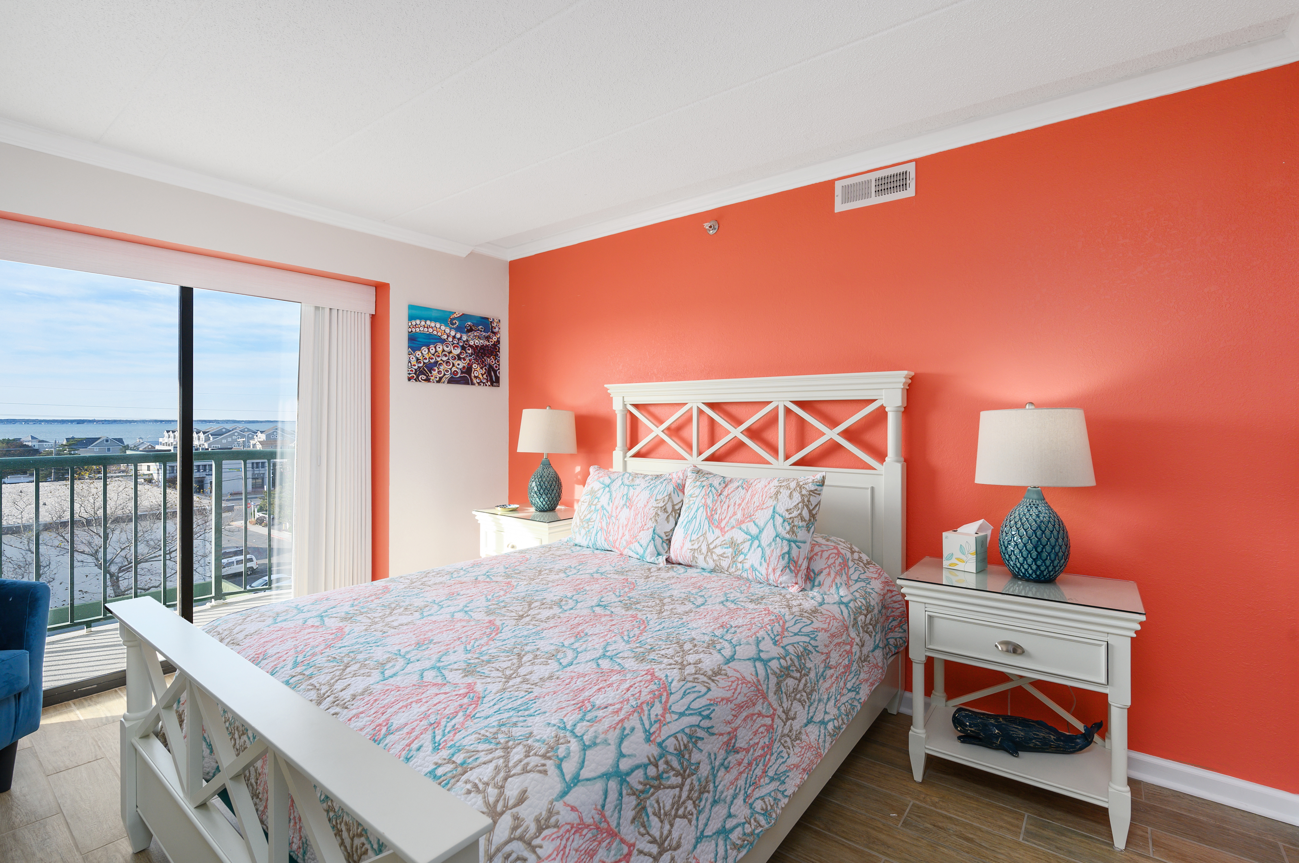 Bedroom 2 welcomes you in with the warm tones and will comfortably sleep 2 in it's Queen Bed
