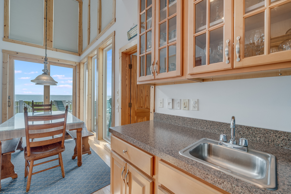 Just off of the Kitchen, you'll find Bedroom 1, along with its En-Suite Bath.