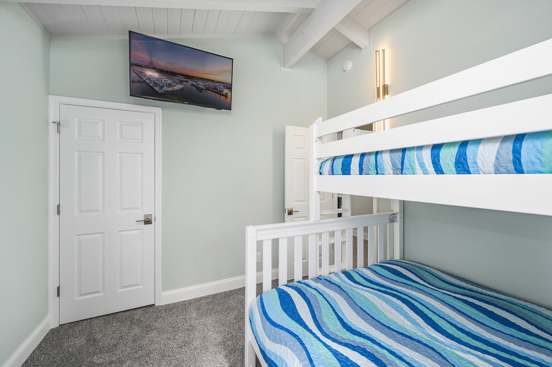 This bedroom offers a pyramid bunk & streaming TV