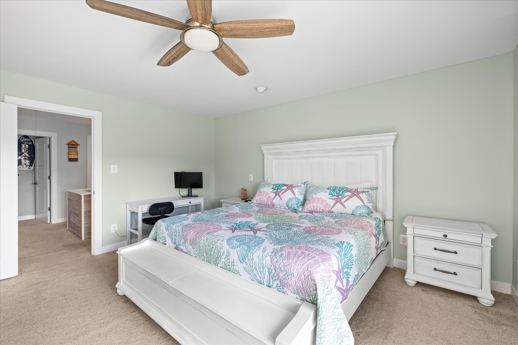 This Spacious Bedroom offers a Plush King Bed.