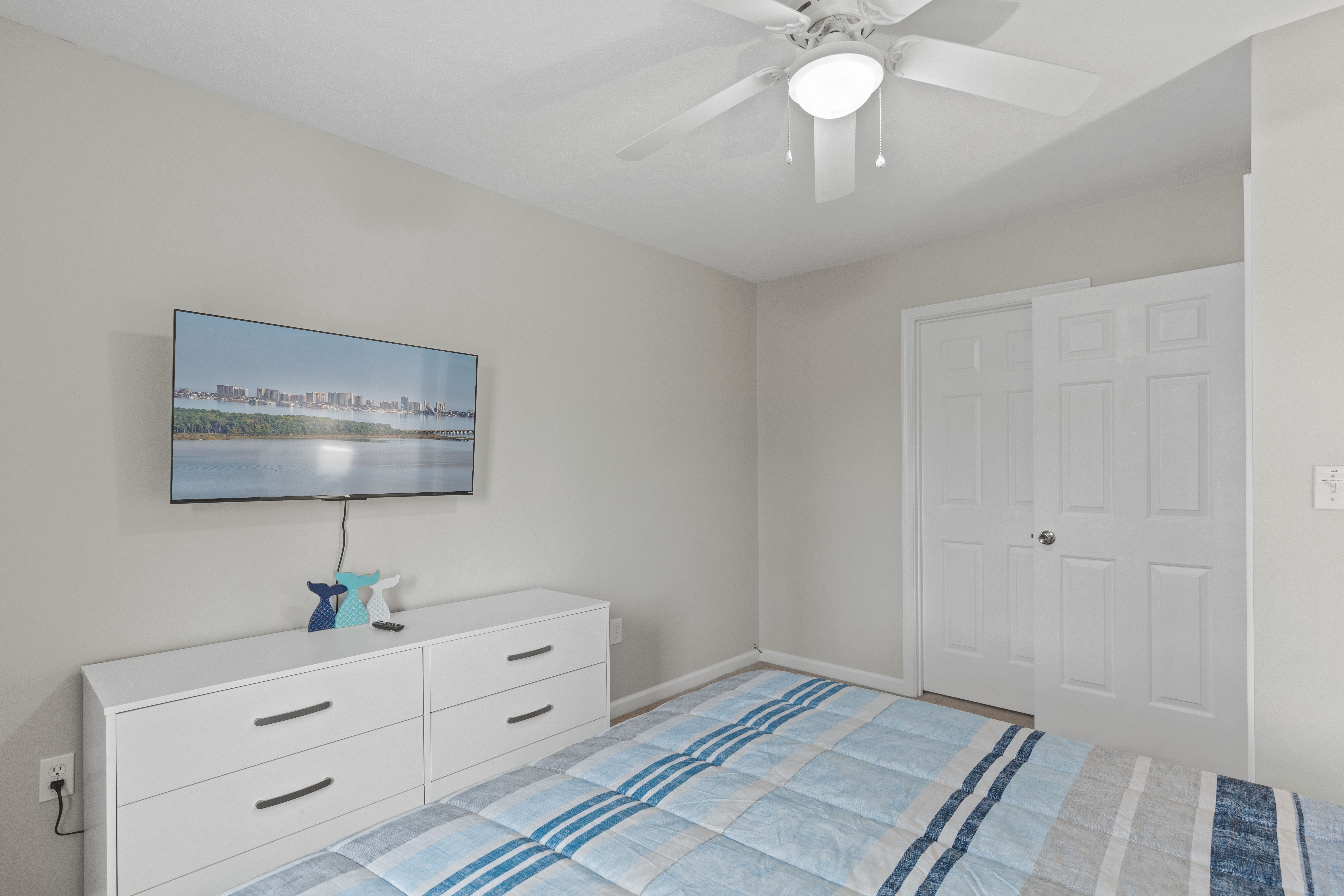 Settle in for the night enjoying your favorite TV show on the Flat screen.