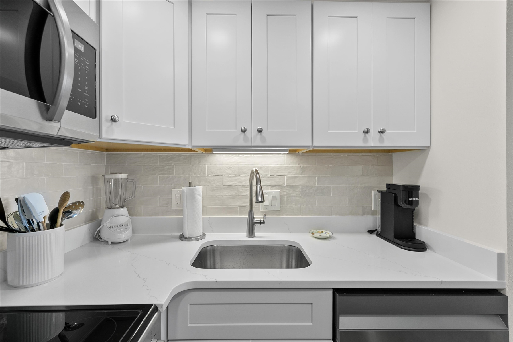 Thoughtful details and modern conveniences throughout the kitchen area.