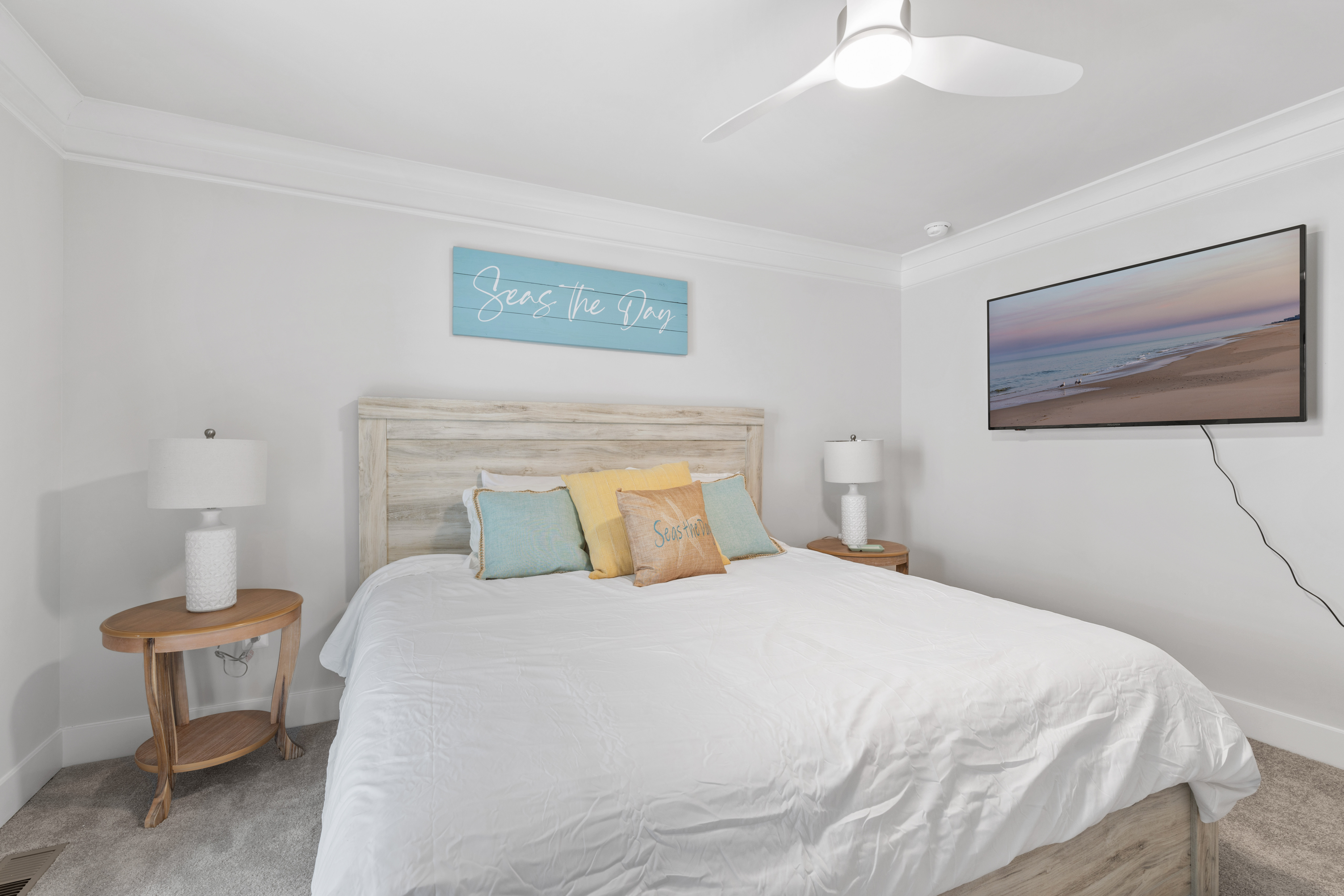 Unwind in the Cozy King bed after a fun day in the sun.