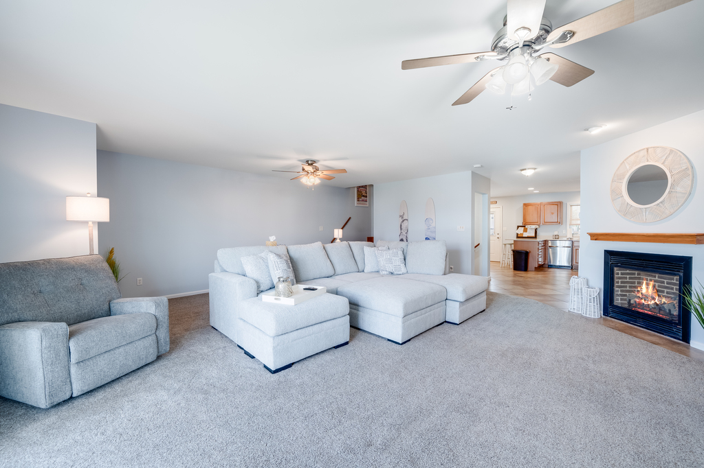 Sink into the oversized sofa for family movie night after a fun-filled day at the beach.