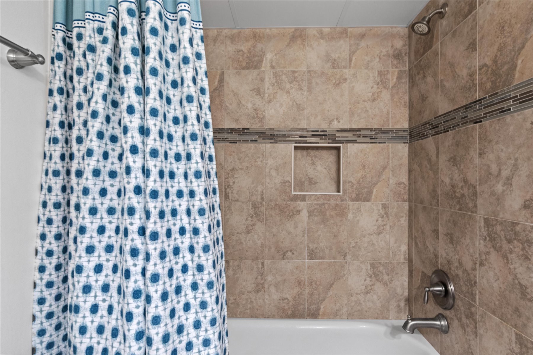 With a Shower/Tub Combo.