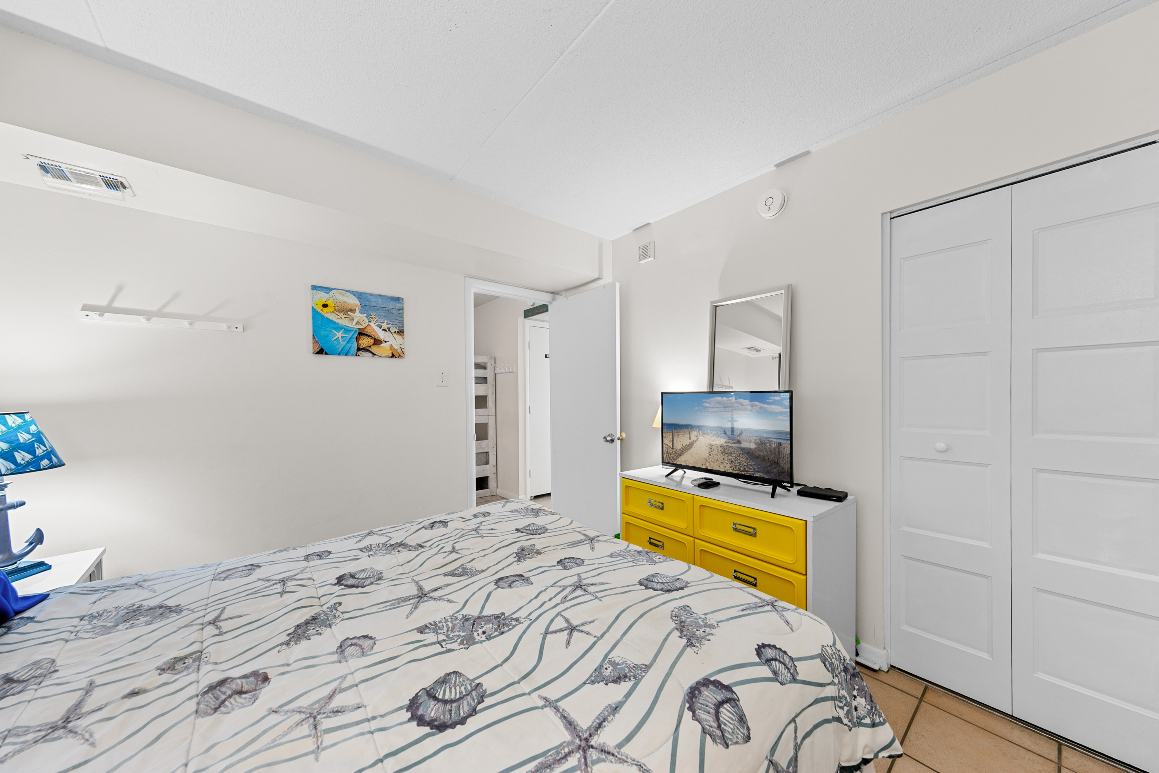 Sink into the Queen bed and enjoy your favorite shows on the Flat Screen TV!