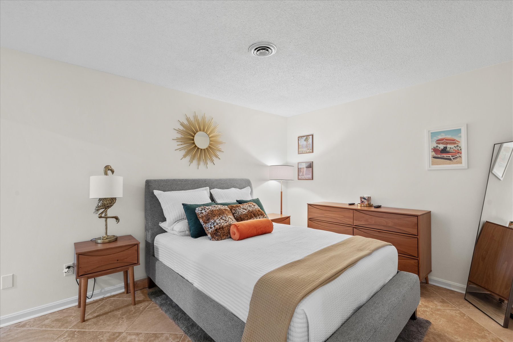 The Primary Bedroom has a cozy Queen Bed.