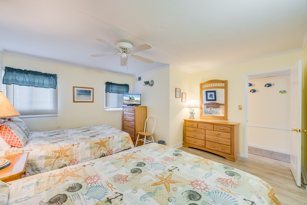 Sink into the Cozy Queen Beds and curl up with a good book!