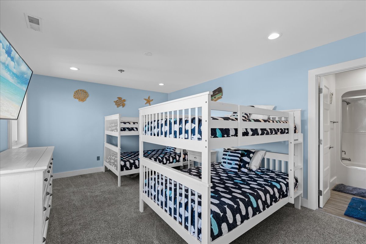 The kids will love this large and open ocean themed 4th bedroom.