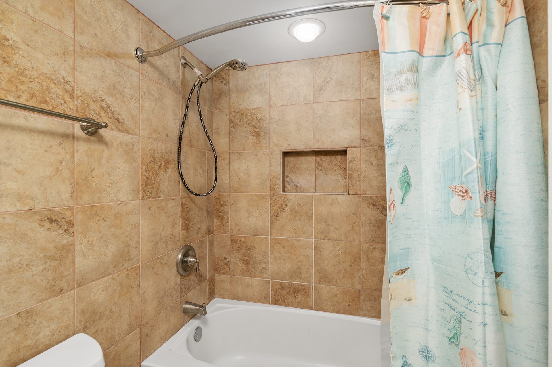 Freshen up after your Beach day in the Shower/Tub Combo.