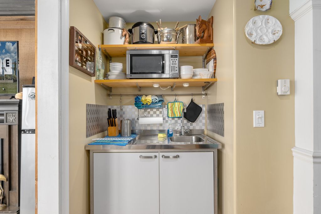 Kitchenette has Coffee Maker, Dutch Oven, Instant Pot, and Microwave - perfect for a quick bite before hitting the Beach.