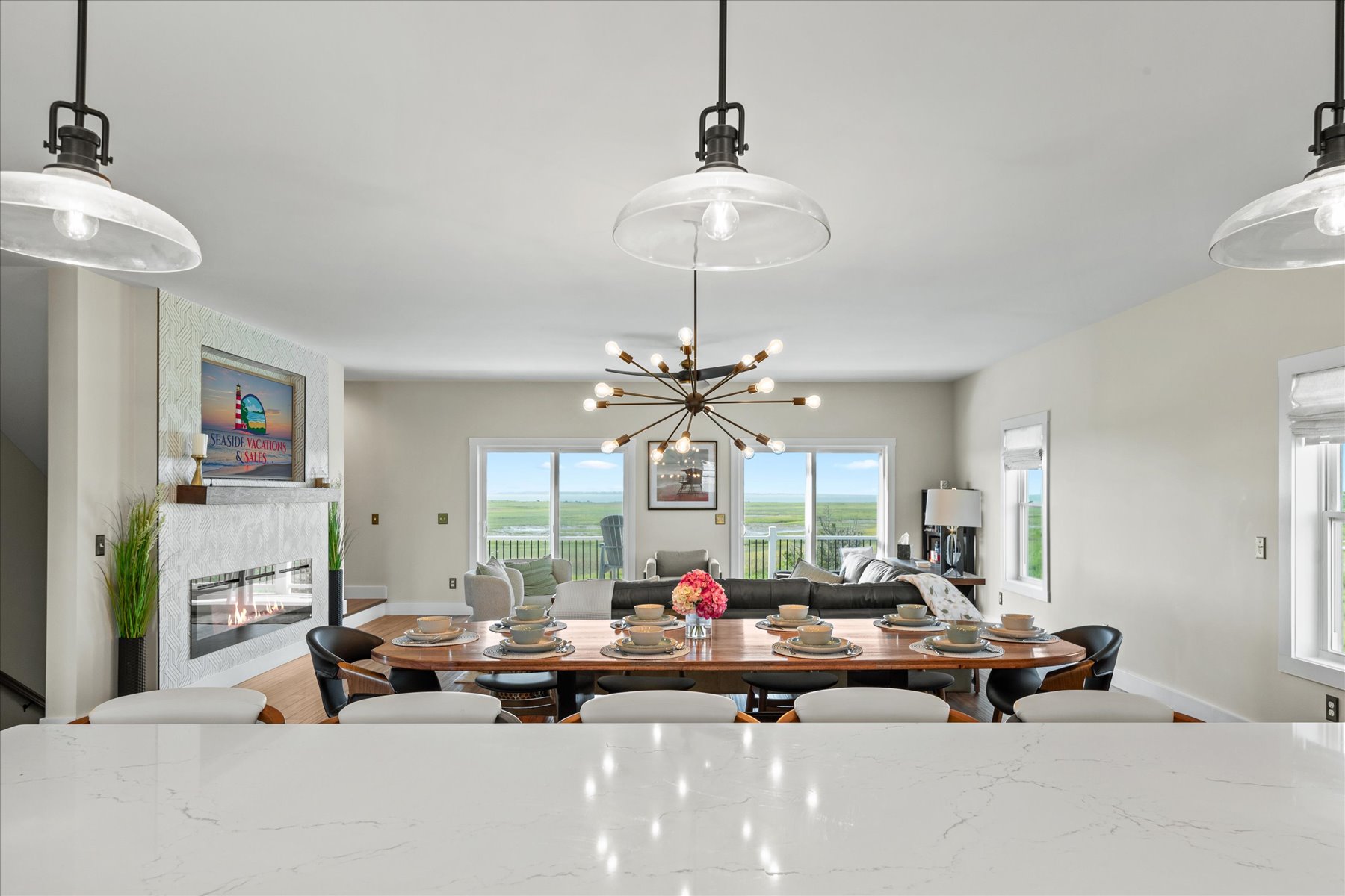 Looking from Kitchen to Dining Area and Living Area.