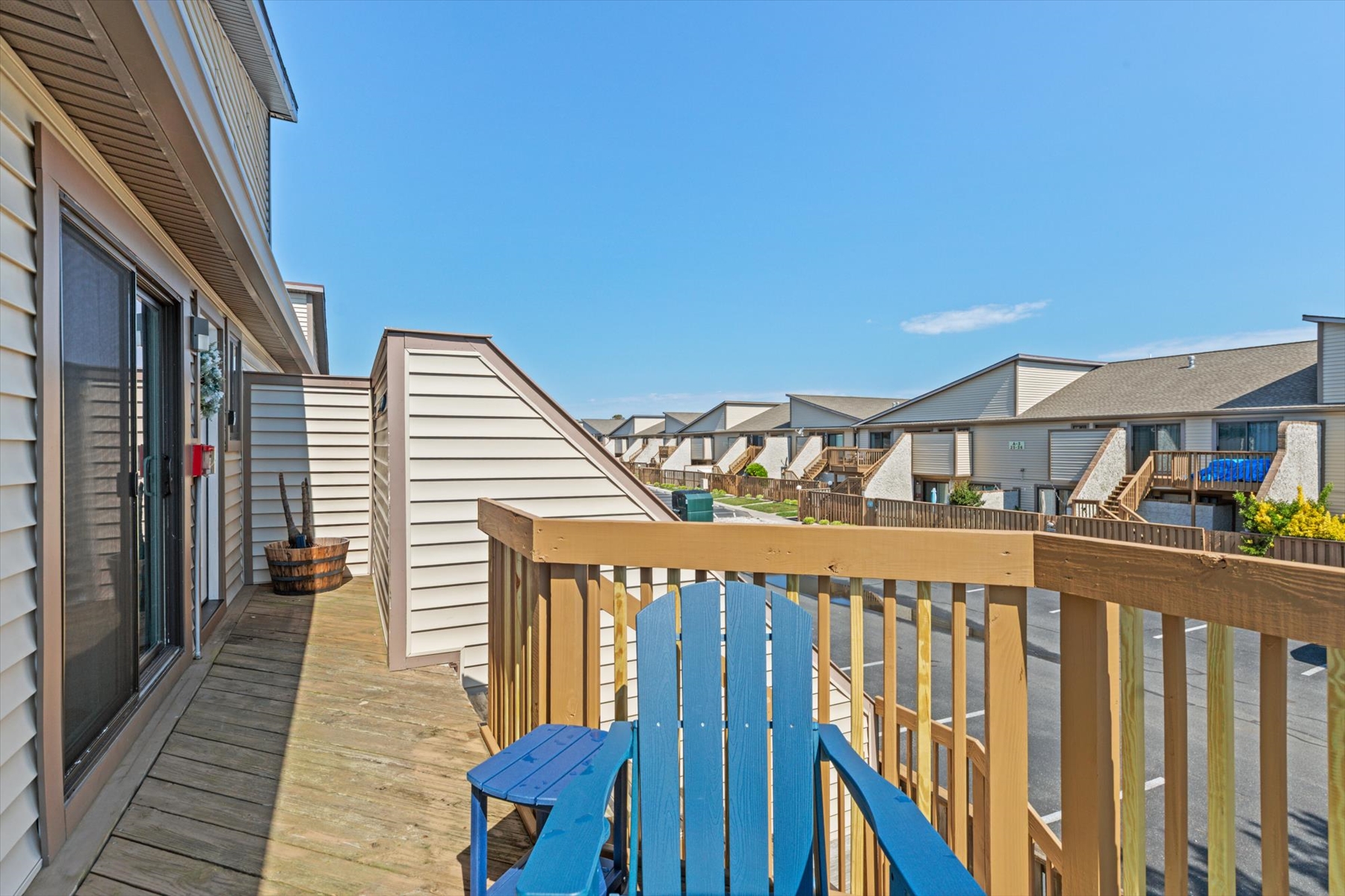 Relax in your private outdoor space and take in the sunny blue skies over the community.